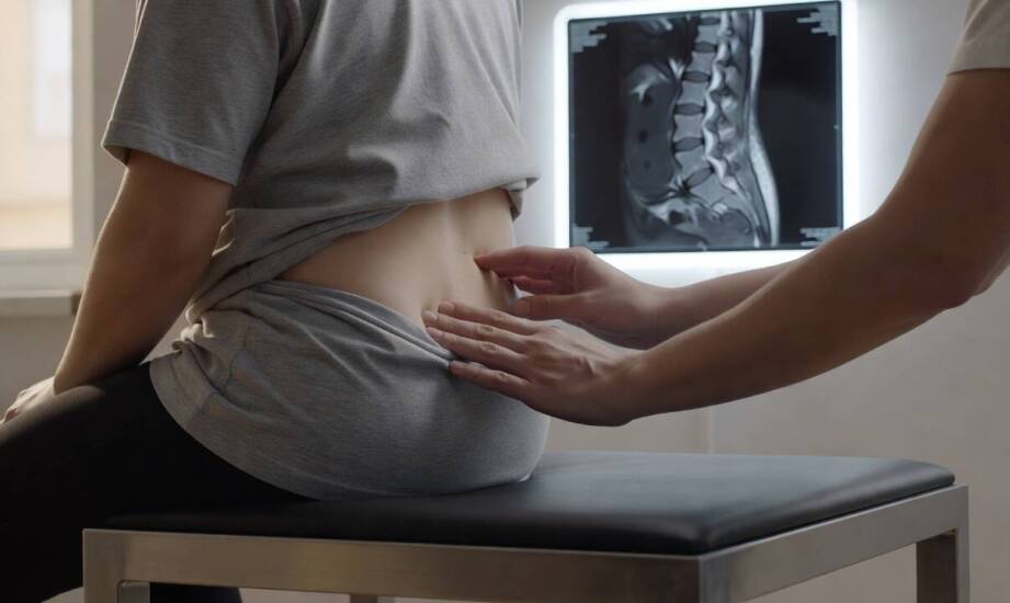 Czerwone flagi w bólu pleców — kiedy objawy wymagają pilnej diagnostyki obrazowej przed podjęciem terapii manualnej