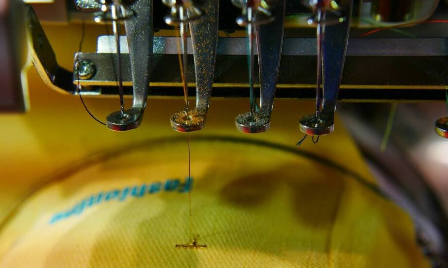 Jak personalizować zapaski gastronomiczne z haftem komputerowym?
