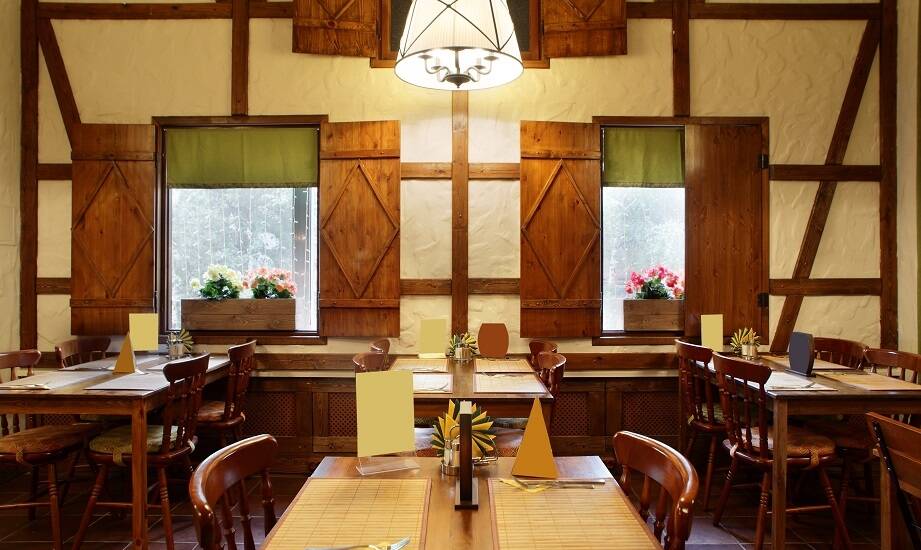 Jak drewniane elementy wystroju wpływają na atmosferę karczmy?