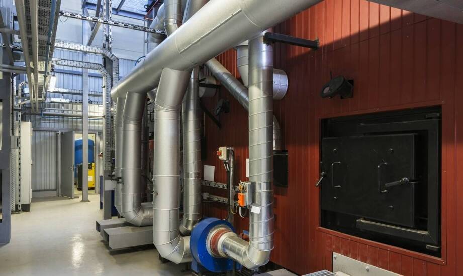 Węzły grzewcze w budownictwie przemysłowym – zastosowania i korzyści