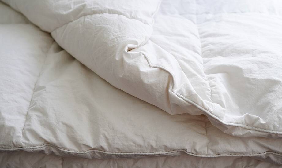 Termoizolacyjne właściwości kołdry puchowej 160x200 - co warto wiedzieć?