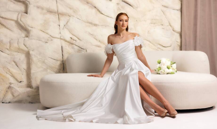 Ekskluzywne projekty sukien ślubnych – jak spełniają marzenia Panien Młodych?