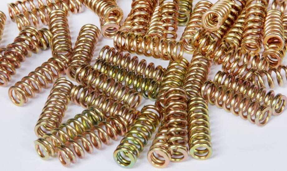 Sprężyny spiralne taśmowe jako kluczowy element w systemach zabezpieczeń