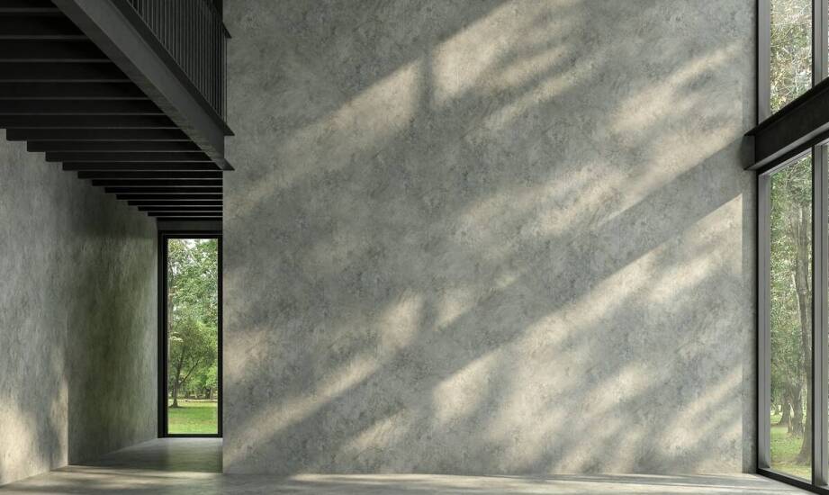 Jakie są główne korzyści z użycia konstrukcyjnego betonu w budownictwie mieszkaniowym?