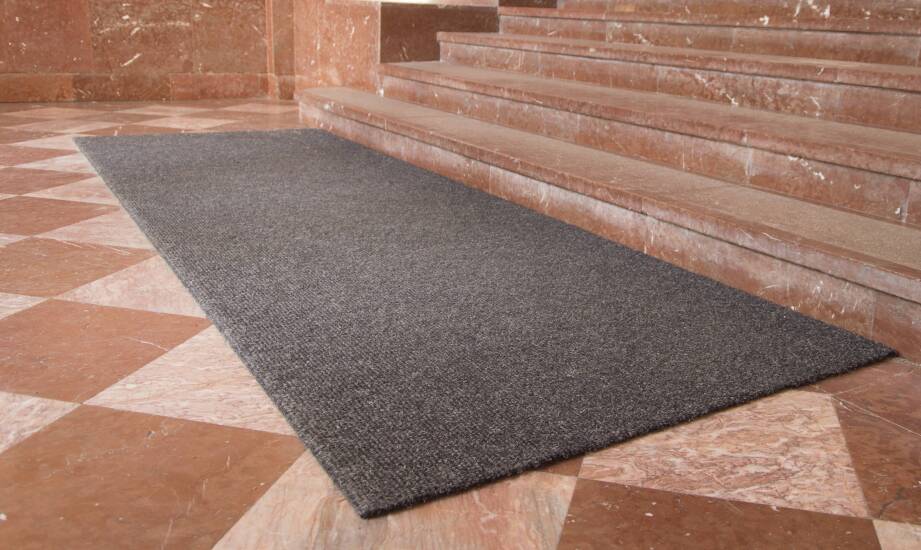 How Commercial Entrance Mats Contribute to Cleaning Savings