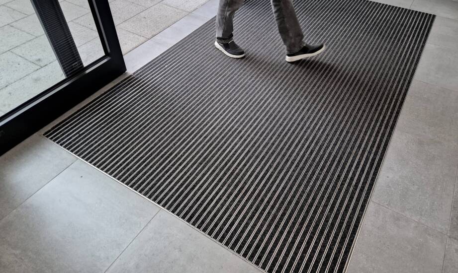 How does modern mat design affect the perception of Commercial Spaces?