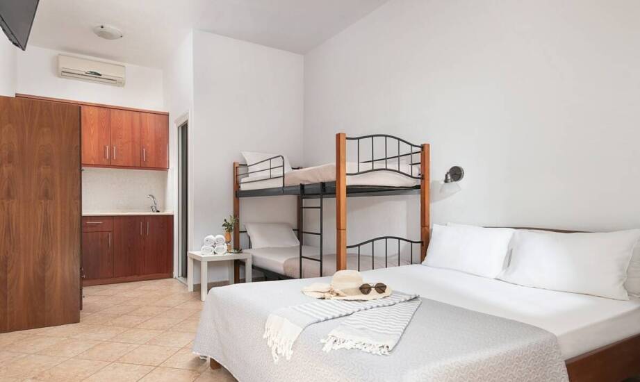 Jak nasze pokoje z kuchennym aneksem ułatwiają rodzinny pobyt?