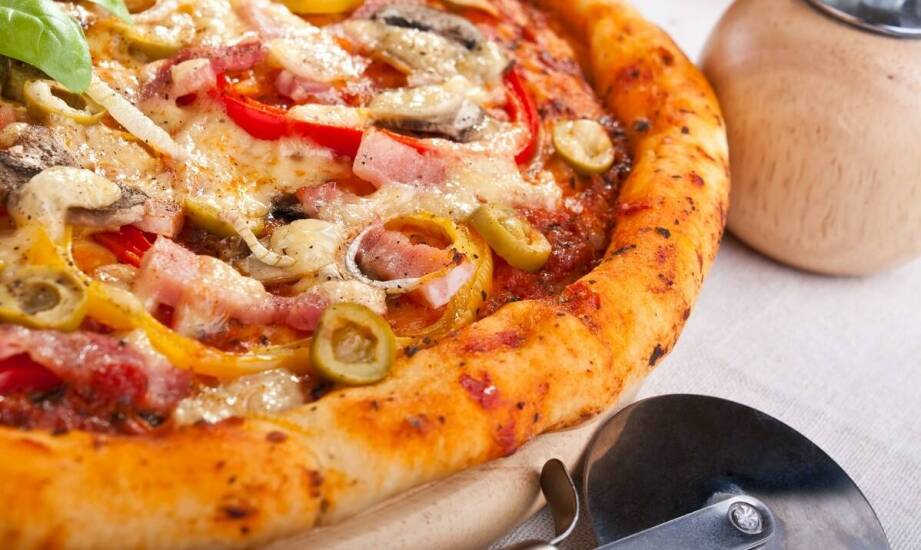 Wybierz swoje ulubione dodatki do pizzy na stadionie i stwórz własną kompozycję.