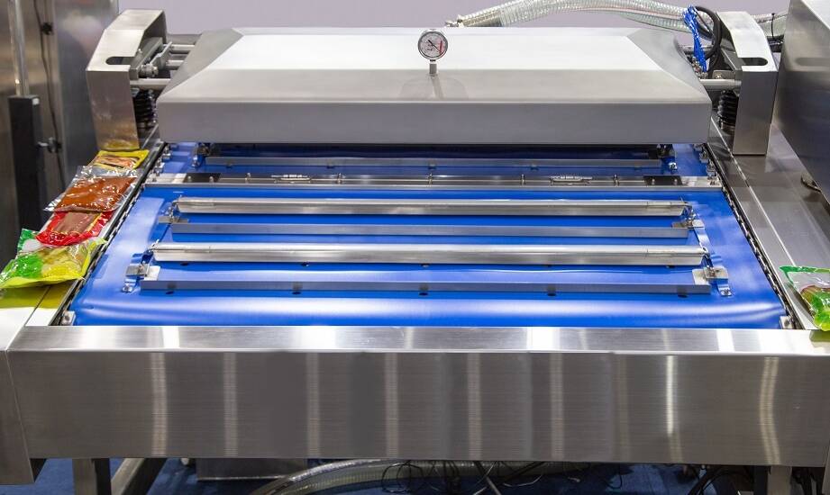 Jak teflon wpływa na wydajność zgrzewarek do opakowań?