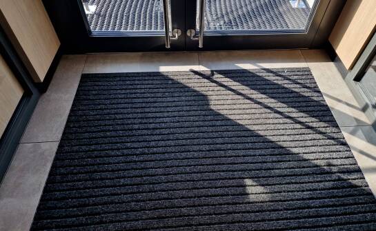 The role of custom entrance mats in creating a positive brand image