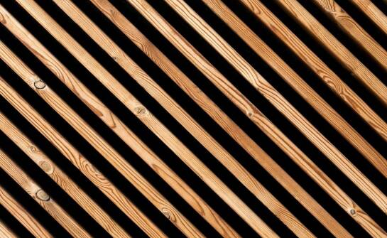 Proces impregnacji drewna: kluczowy etap w produkcji konstrukcji dachowych