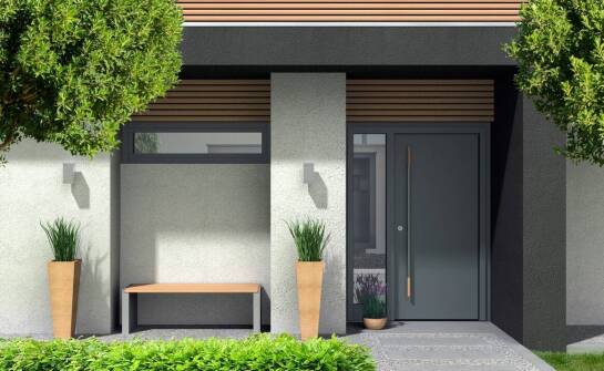 Białe drzwi zewnętrzne w budownictwie energooszczędnym