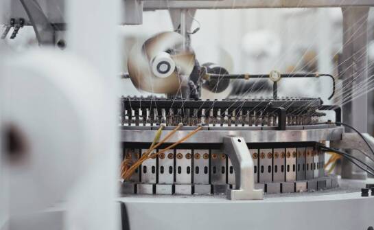 Innowacyjne technologie w maszynach pakujących Minipack – jak zmieniają produkcję