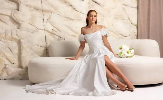 Ekskluzywne projekty sukien ślubnych – jak spełniają marzenia Panien Młodych?