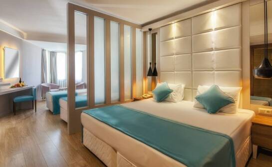 Przewodnik po standardach hotelowych łóżek – czym się różni rozmiar queen size?