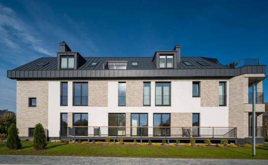 Estetyka i funkcjonalność: elewacja z dodatkiem cegły jako nowoczesne budowlane rozwiązanie