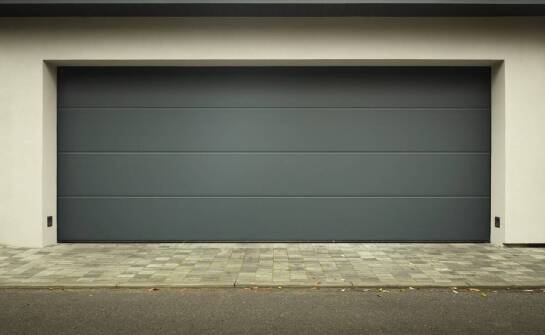 Praktyczne aspekty użytkowania i konserwacji garażu z warstwowej płyty