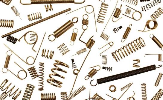 Stożkowe sprężyny naciskowe w urządzeniach AGD – kluczowe aspekty