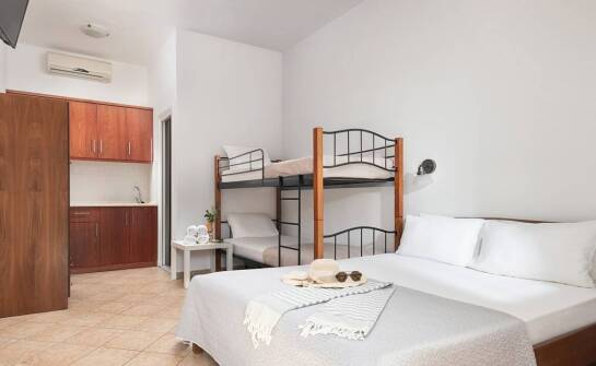 Jak nasze pokoje z kuchennym aneksem ułatwiają rodzinny pobyt?