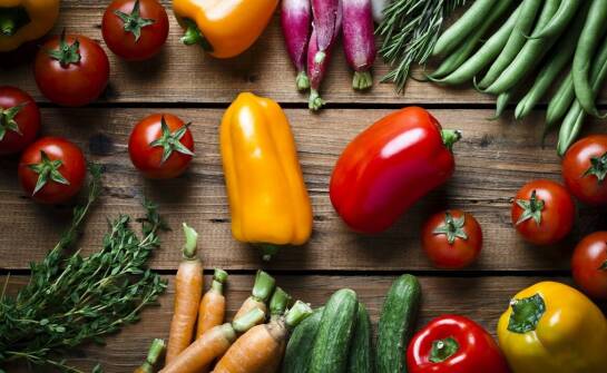 How does a wholesale vegetable supplier support seasonal restaurant menus?