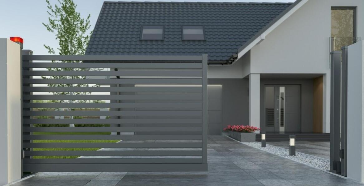 Zalety montażu siłowników do bramy dwuskrzydłowej dla bezpieczeństwa i wygody