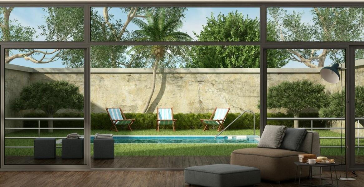 Comment les systèmes coulissants influencent l'esthétique et la fonctionnalité des grandes baies vitrées ?