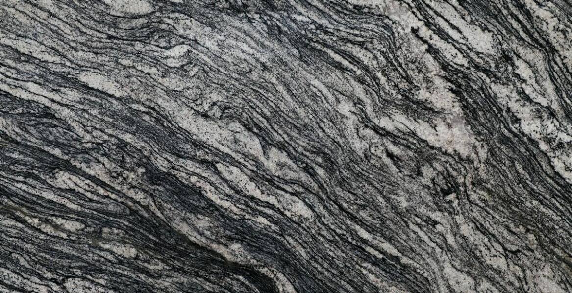 Jakie są kluczowe cechy granitu jako materiału na kamień na pomniki?