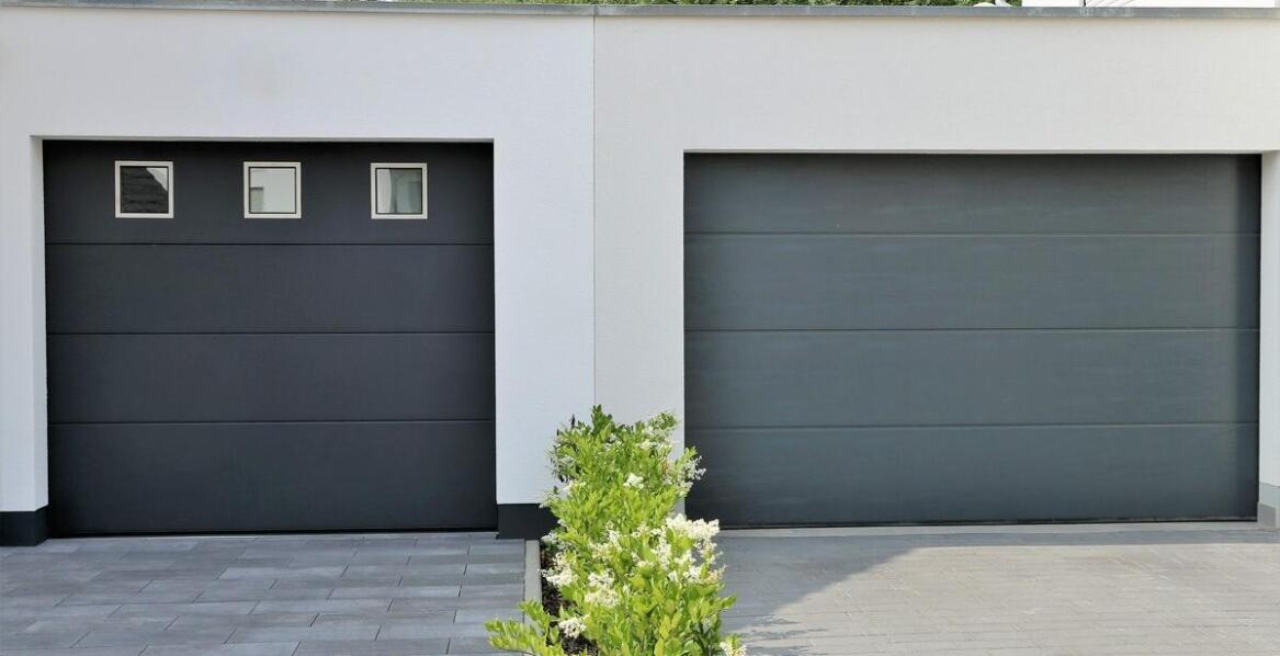 Najnowsze technologie w produkcji bram garażowych 500x250 – co oferujemy?