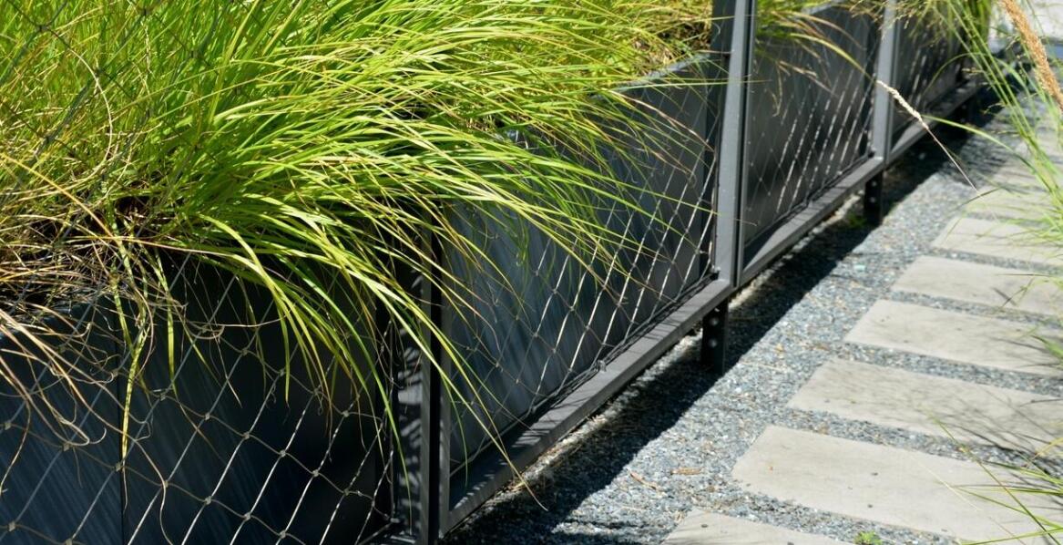 Jak donice z betonu mogą pomóc w ochronie roślin przed warunkami atmosferycznymi?