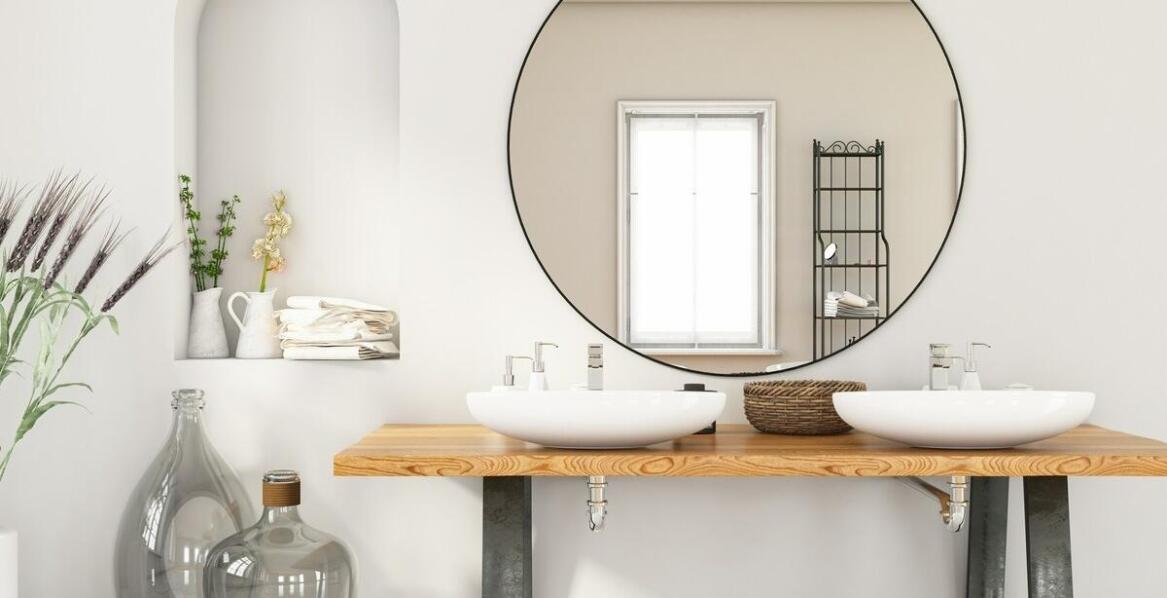 Jakie style wnętrzarskie najlepiej komponują się z lustrami w czarnej ramie?