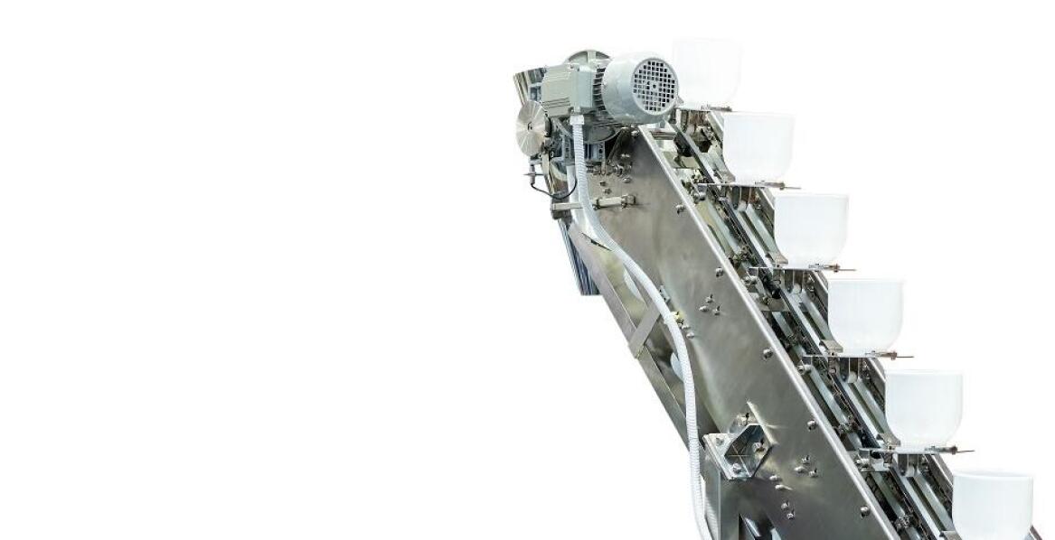 Przenośnik kubełkowy do zboża a bezpieczeństwo pracy w zakładach produkcyjnych