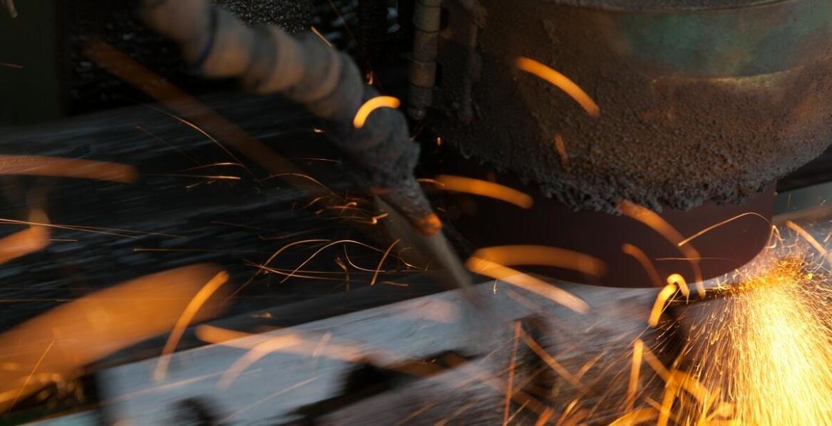 How do deburring machines improve sheet metal production quality?